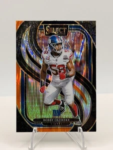 Bobby Okereke 2024 Panini Select Black & Orange Prizm Shock 109 - Picture 1 of 2
