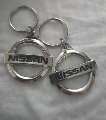 2 Nissan Logo Metal Key Chain Ring OEM from car lot NEW  Foto 1 de 4