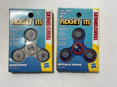 LOTE DE 2 TRANSFORMADORES MEGATRON + OPTIMUS PRIME FIDGET SPINNERS FIDGET SU NUEVO Foto 1 de 4