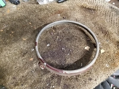 1986 BMW 325i (E30) Misc. Halogen Headlight Parts (frames, buckets, screws) - Image 1 of 4