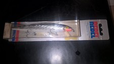  FISHING LURE REBEL IN ORIGINAL PACKAGING.