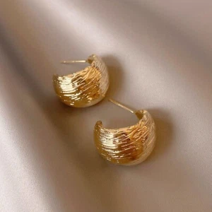 Stylish wide-faced semi-curved gold earrings - Picture 1 of 6