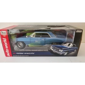 Auto World 1962 Pontiac Grand Prix scala 1:18 insegna blu nuova con scatola - Foto 1 di 5