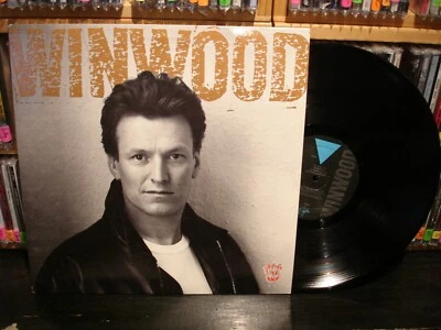 Steve Winwood – Roll with It     Vintage LP copy#2 - Image 1 of 4