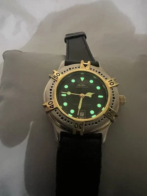 quiksilver antiguo nuevo stock, fecha, 50 m, súper luminoso, bisel giratorio, esfera verde, dama Foto 1 de 4