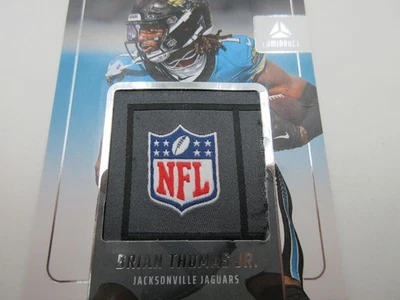 Camisetas Luminance XL 2025 Brian Thomas Jr. JaGuars LOGO JUMBO parche LEER * Foto 1 de 4