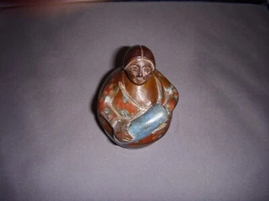 Vintage Folk Art Wood Carving of an Old Woman Holding Blanket Roll - Picture 1 of 6