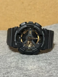 Casio G Shock WR20bar 5146 GA-110GB Black Gold MEN Watch Alarm Chrono World - Picture 1 of 7