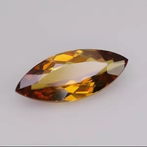 6.82 carats honey gold with red sparks natural sphene pakistan 20100118 - Picture 1 of 6