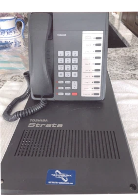 toshiba strata phone system  8 phones - Image 1 of 3