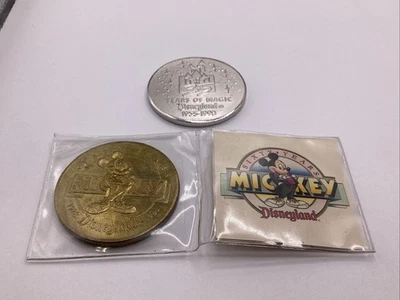 2 Disney Disneyland Coins 60 Years Mickey And 35 Years Disneyland  - Image 1 of 4