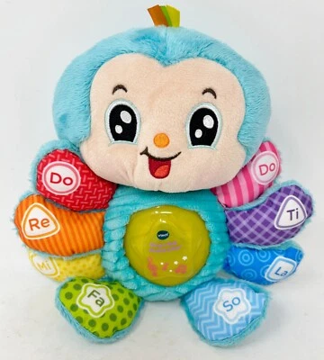 VTech Babies Snug-a-Bug Musical Critter - Brinquedo de pelúcia interativo FUNCIONA - Imagem 1 de 4