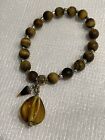Matte Tigereye Stone Bracelet W/Gold Accent Beads, Amber & Tortoiseshell Charms