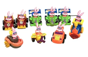 9 CONEJITOS RODANTES ROSAS PEQUEÑOS PLATEADOS DE COLECCIÓN EN COCHE BARCO AVIÓN TREN JUGUETES DE PASCUA - Imagen 1 de 5