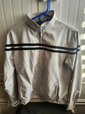 Chaqueta cortavientos Izod pequeña para mujer cremallera completa Torrey Pines logotipo de golf a rayas  Foto 1 de 4