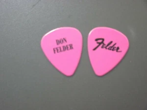 Eagles guitar pick Don Felder with Fender Guitar type logo black on dark pink !! - Picture 1 of 1