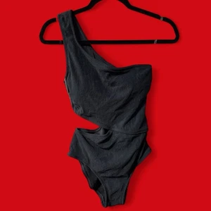 Michael Kors Größe 10 seitlich offen One-Shoulder-Badeanzug einfarbig gerippt schwarz 98 $ neu - Bild 1 von 8