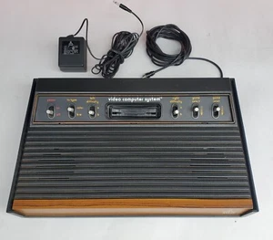 Atari 2600 Tested. 10 Games, 2 Joysticks, 4 Paddles, Big Joystick, Owners Manual - Picture 1 of 13