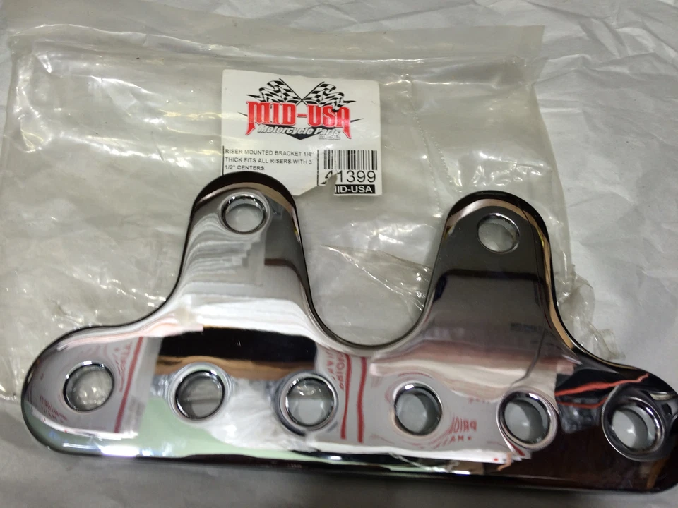 Soporte elevador de 1/4"" de espesor para elevadores con centros de 3 1/2"" Foto 1 de 1