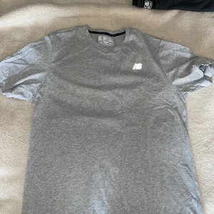 New Balance hellgraues Tech Kurzarm Shirt Gr. XL - Bild 1 von 4