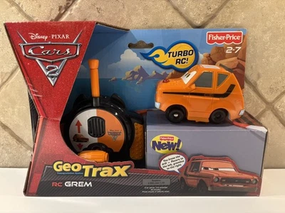 NEW-GEOTRAX TRAIN AND REMOTE - Disney Pixar RC Cars 2 - Grem / Gremlin - V9967 - Image 1 of 4