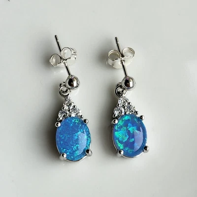 Pendientes de plata de ley 925 natural 8x10 mm ovalado azul ópalo zafiro 3/4"" Foto 1 de 3