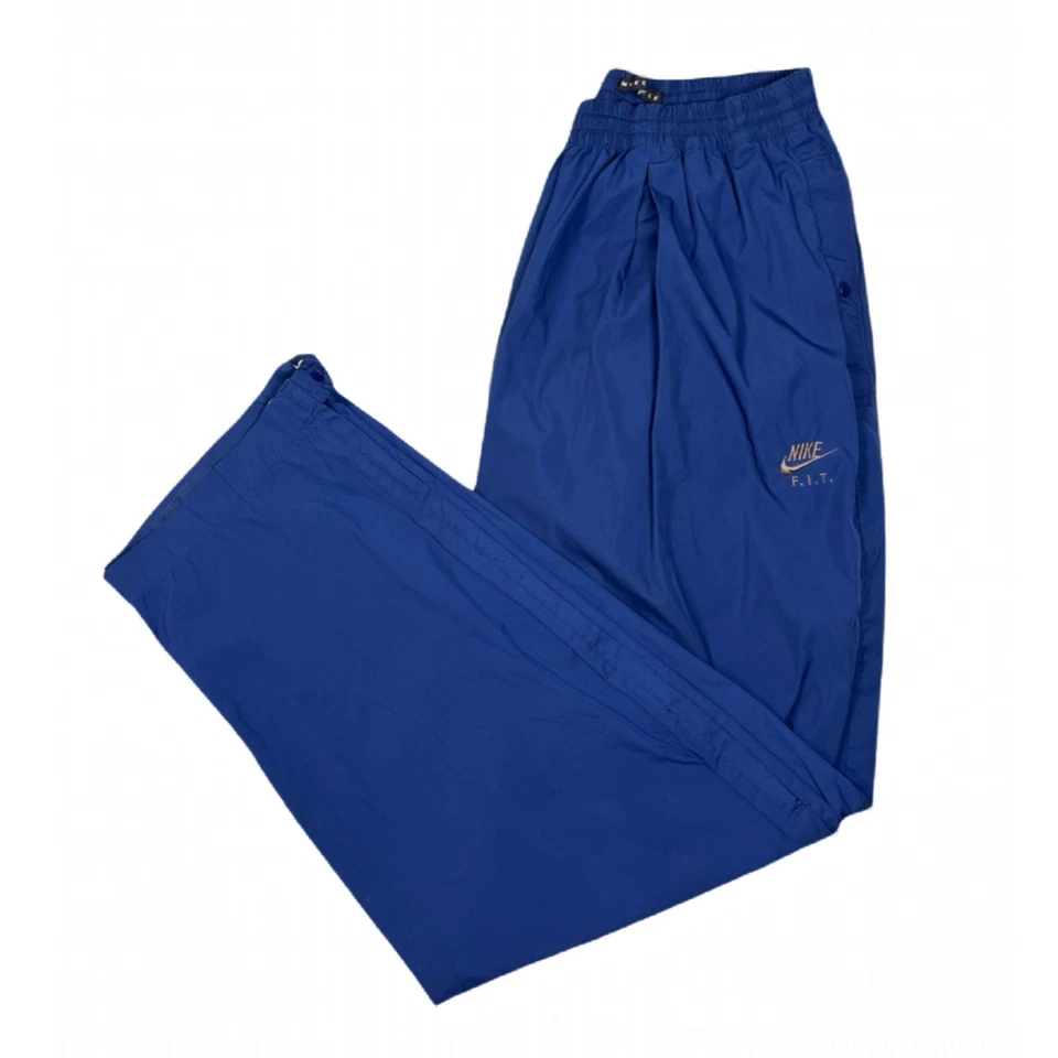 Pantalones de lluvia vintage Nike Golf Y2K para hombre cortavientos cremallera tobillo pista azul marino XL Foto 1 de 4