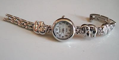 Reloj para mujer con acabado plateado elefante buena suerte moda informal esfera numérica Foto 1 de 4