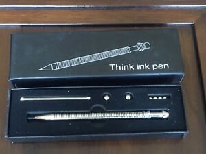 NEW STAINLESS STEEL THINK INK PEN IN BOX FIDGETER MAGNETIC 