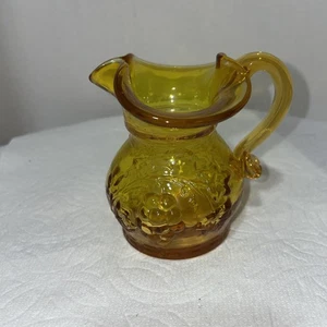 Vintage 3.5 inch Amber Glass Pitcher with a Raised Grape Vine Vinaigrette Dress - Picture 1 of 7