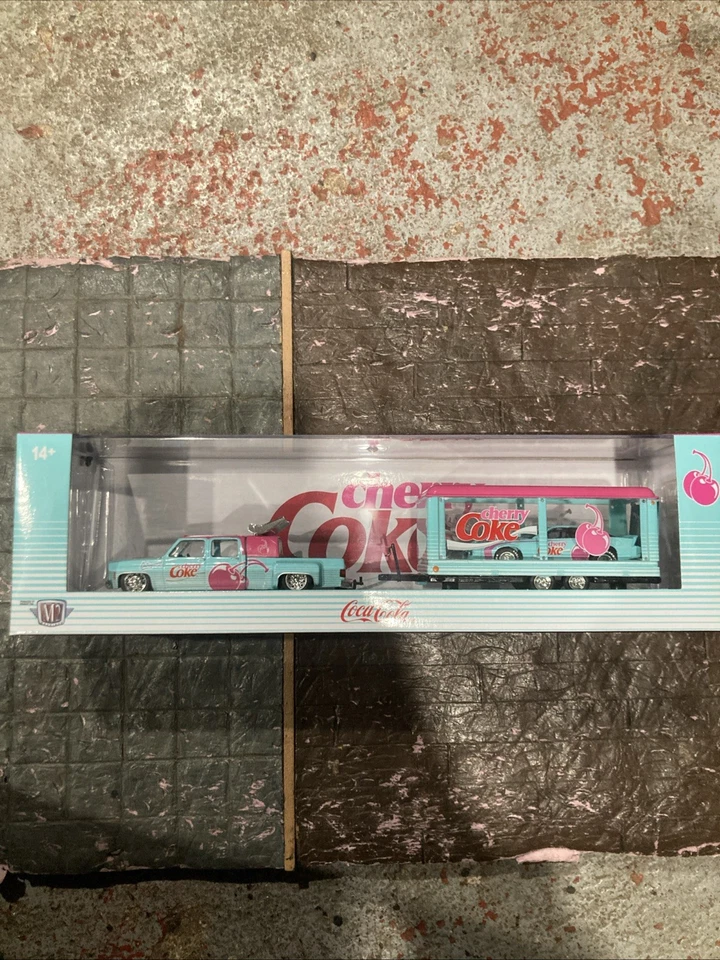 M2 Machines Cherry Coke Hauler 1973 Cheyenne & 1985 Chevrolet Camaro IROC-Z TW40 - Image 1 of 4