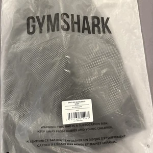 Camiseta Gymshark Onyx 5.0 Sin Costuras Manga Corta Negra/Gris Ónix Mediana NUEVA - Imagen 1 de 2