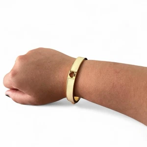 Kate Spade Cream Enamel Cut‑Out Gold‑Tone Hinged Bracelet - Picture 1 of 4