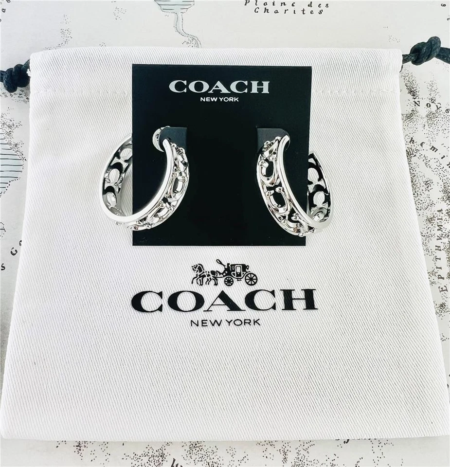 Nuevos pendientes de aro Coach Signature en C de plata Foto 1 de 1