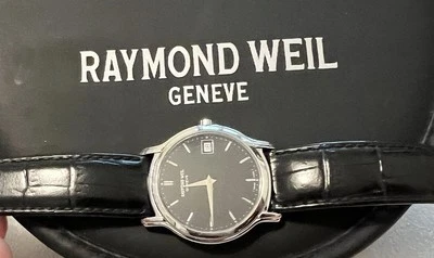 Raymond Weil 5569 esfera negra. No funciona asume que es batería. Estuche no incl Foto 1 de 3