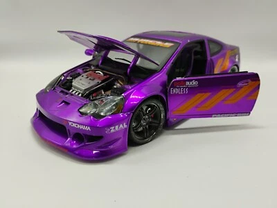 Afinadores musculares Acura RSX púrpura escala 1:18 Muscle Machines para repuestos o reparación Foto 1 de 4