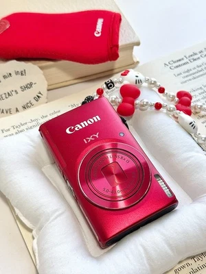 Canon IXUS140/ELPH130IS Red-Smart IS, 8x Zoom, Wi-Fi, Eye-Catching Red Camera - Image 1 of 4