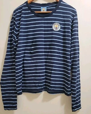 Camiseta Manchester City talla 14 manga larga  Foto 1 de 4