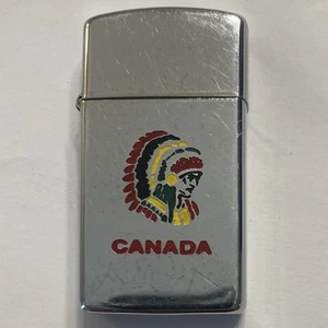 1989 ZIPPO SLIM LIGHTER NIAGARA FALLS CANADA INDIAN NATIVE CHIEF HEAD 4 COLOUR - Picture 1 of 6