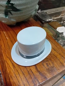 Sombrero de copa vintage Moss Bros Covent Garden cerámica publicidad sombreros grises - Imagen 1 de 4