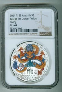 AUSTRALIA 2024 P125 $1 YEAR OF THE DRAGON-YELLOW FACING NGC MS-69 - Picture 1 of 2