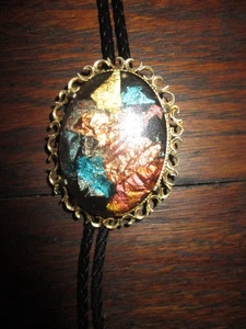 Corbata BOLO vintage parece vidrio dimórfico con cuero trenzado A1 Excelente - Imagen 1 de 5