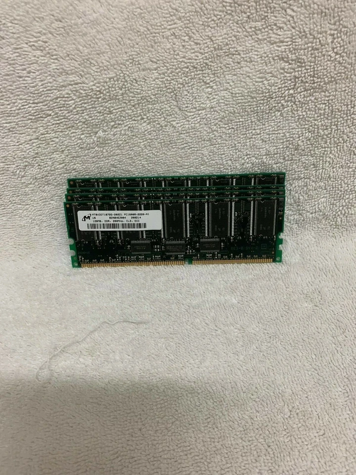 LOT OF 4 MT8VDDT1672G-202Z1 PC1600R-2220-A1 128MB DDR 200MHZ CL2 ECC - Image 1 of 1