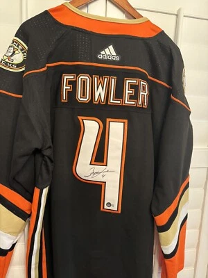 Camiseta deportiva firmada por Cam Fowler de los Anaheim Ducks Beckett certificado de autenticidad BAS Foto 1 de 4