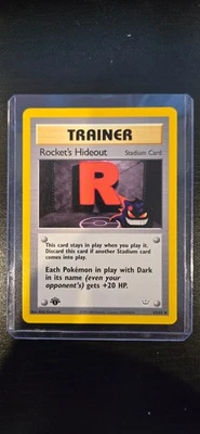 Near Mint 1st Edition Rocket’s Hideout 63/64 Trainer Card - Image 1 of 2