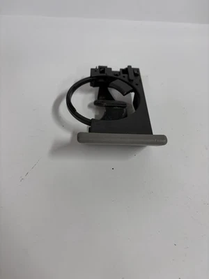 Nissan Z33 350Z 2003-2006 pasajero delantero tablero pop out portavasos gris leer Foto 1 de 4