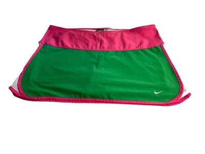 Falda corta Nike Dri-Fit verde tenis golf para mujer talla L borde rosa Foto 1 de 4