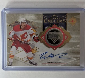 2023-24 Ultimate Emblems Autógrafos Novatos Matthew Coronato #UE-MC Oro/99 - Imagen 1 de 2