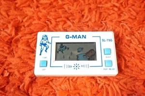 Ultra Rare Vintage 1983 G MAN LCD Handheld Electronic Game SL-75G 80s READ - Bild 1 von 8
