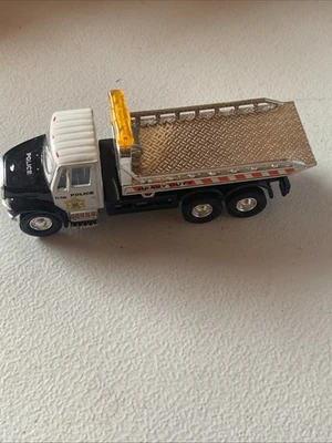 Shing Fat Ltd. RIGS INTERNATIONAL DURSTAR 4400 ROLLBACK Flatbed - Image 1 of 4